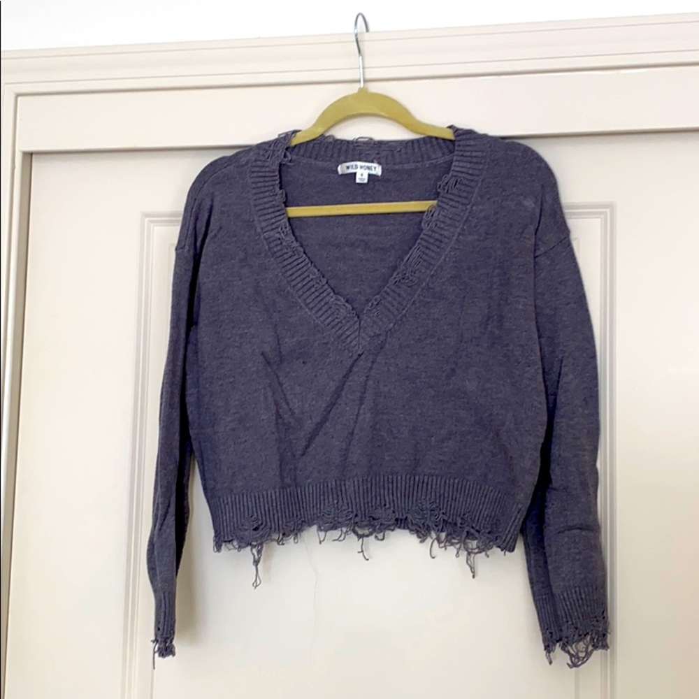 Distressed cropped sweater